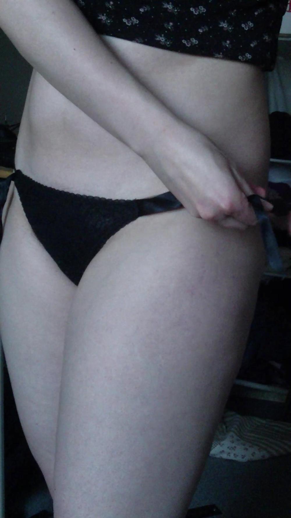 10P Sexy black string covers hairy pussy