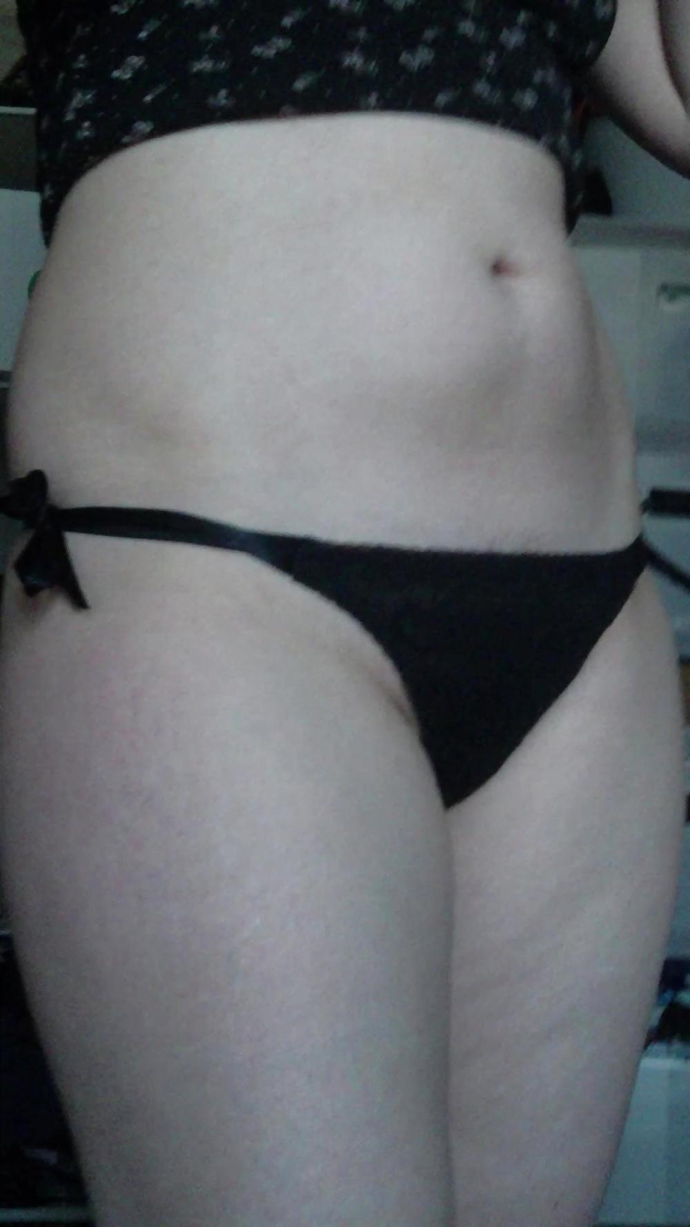 10P Sexy black string covers hairy pussy