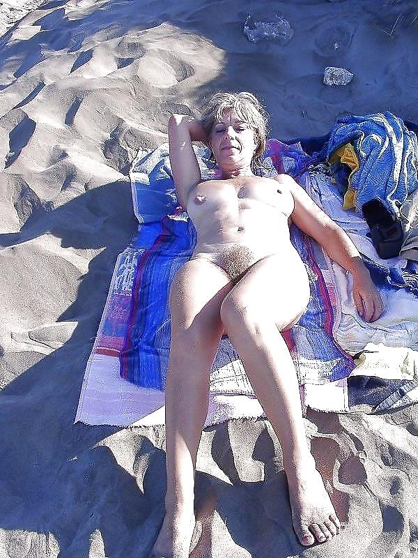 7P Hairy woman on the beach 1
