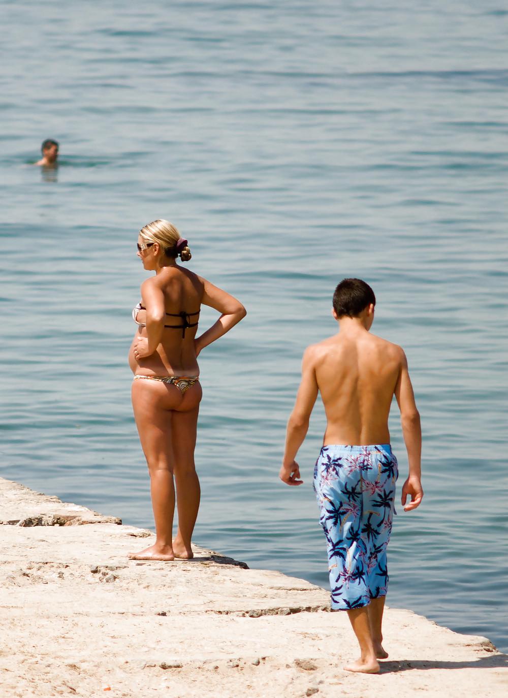 25P Thongs and toplessness on beach Ukraine))