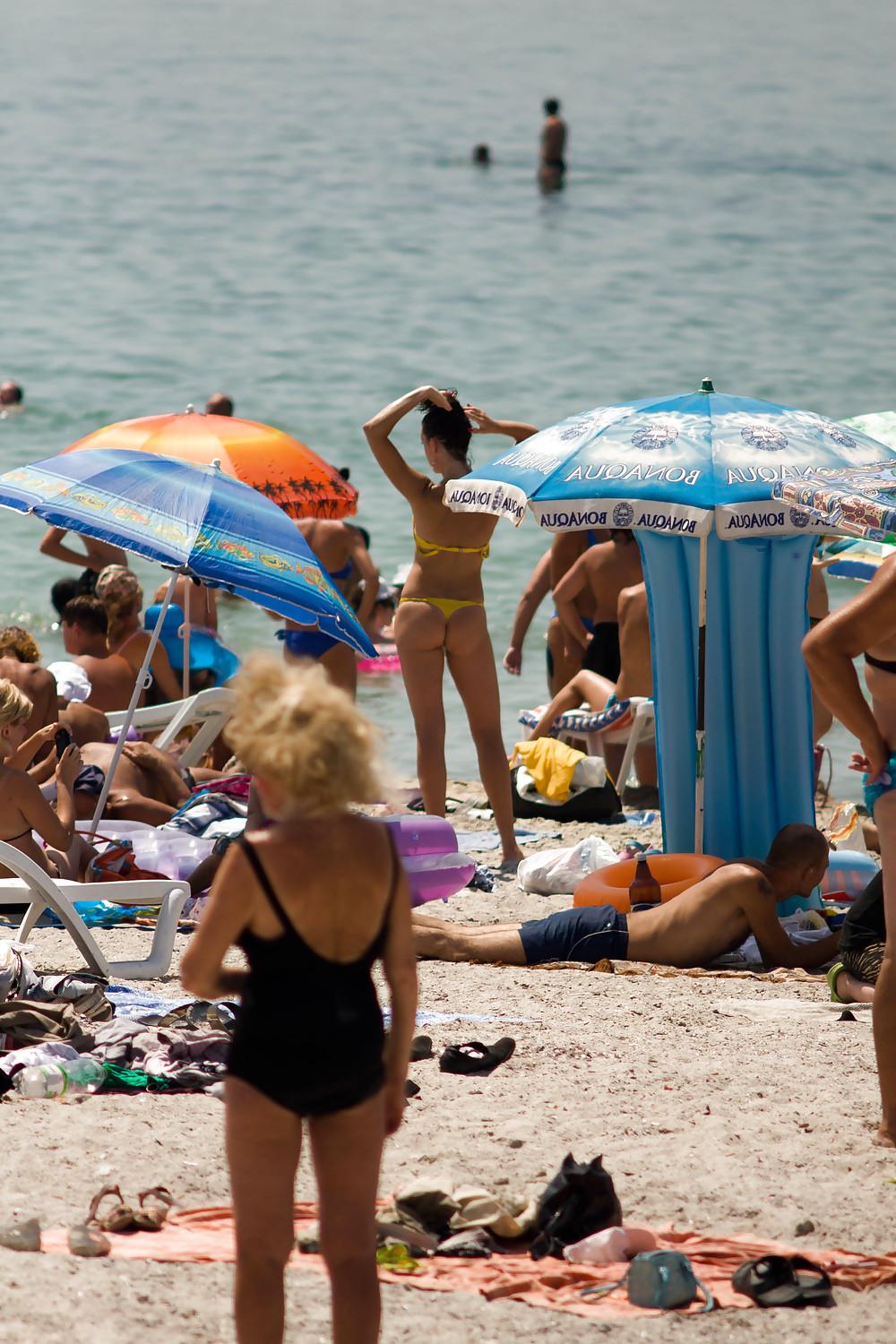 25P Thongs and toplessness on beach Ukraine))
