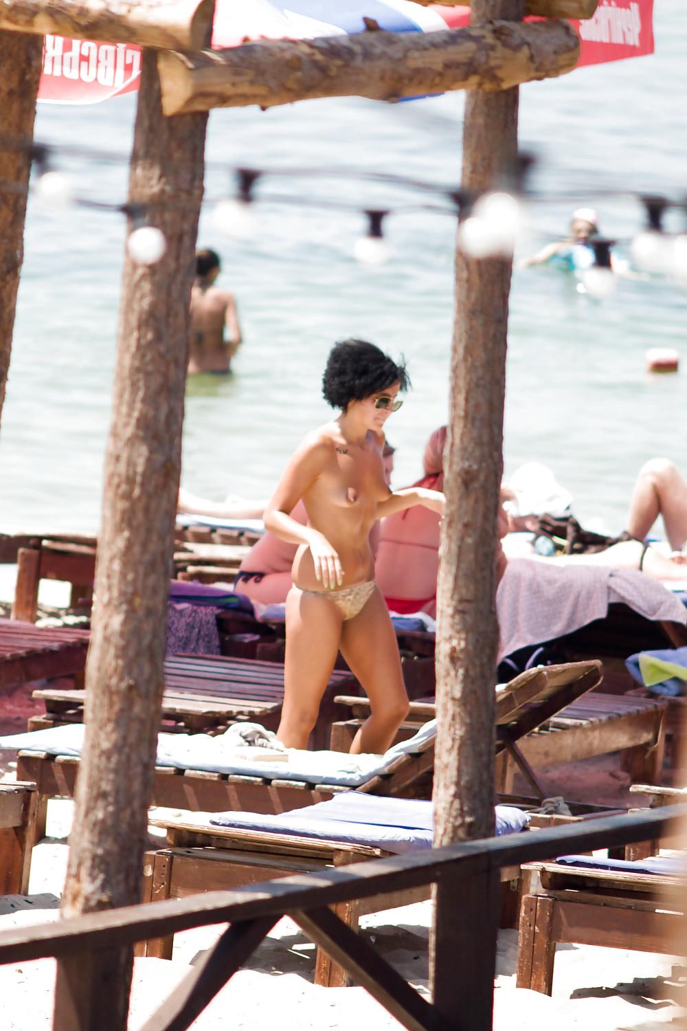 25P Thongs and toplessness on beach Ukraine))