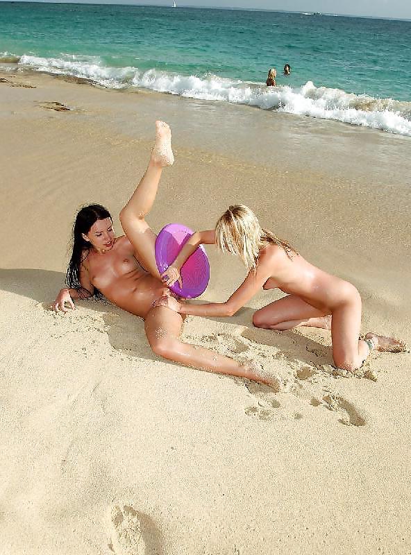 12P Two girls playing with dildo on the beach by Sail