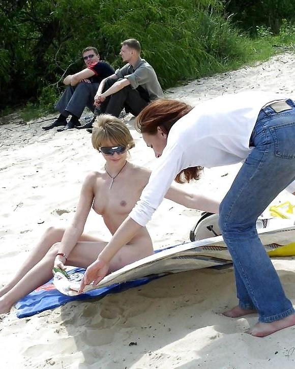 13P Two naturists girls at the beach by Sail