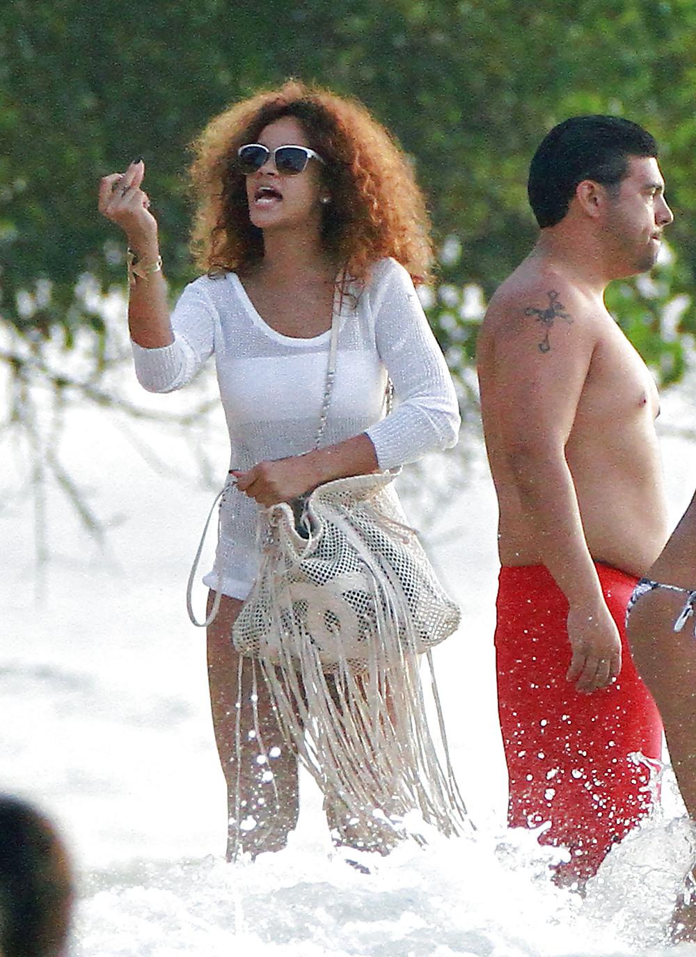 25P Rihanna bikini candids on the beach in Barbados
