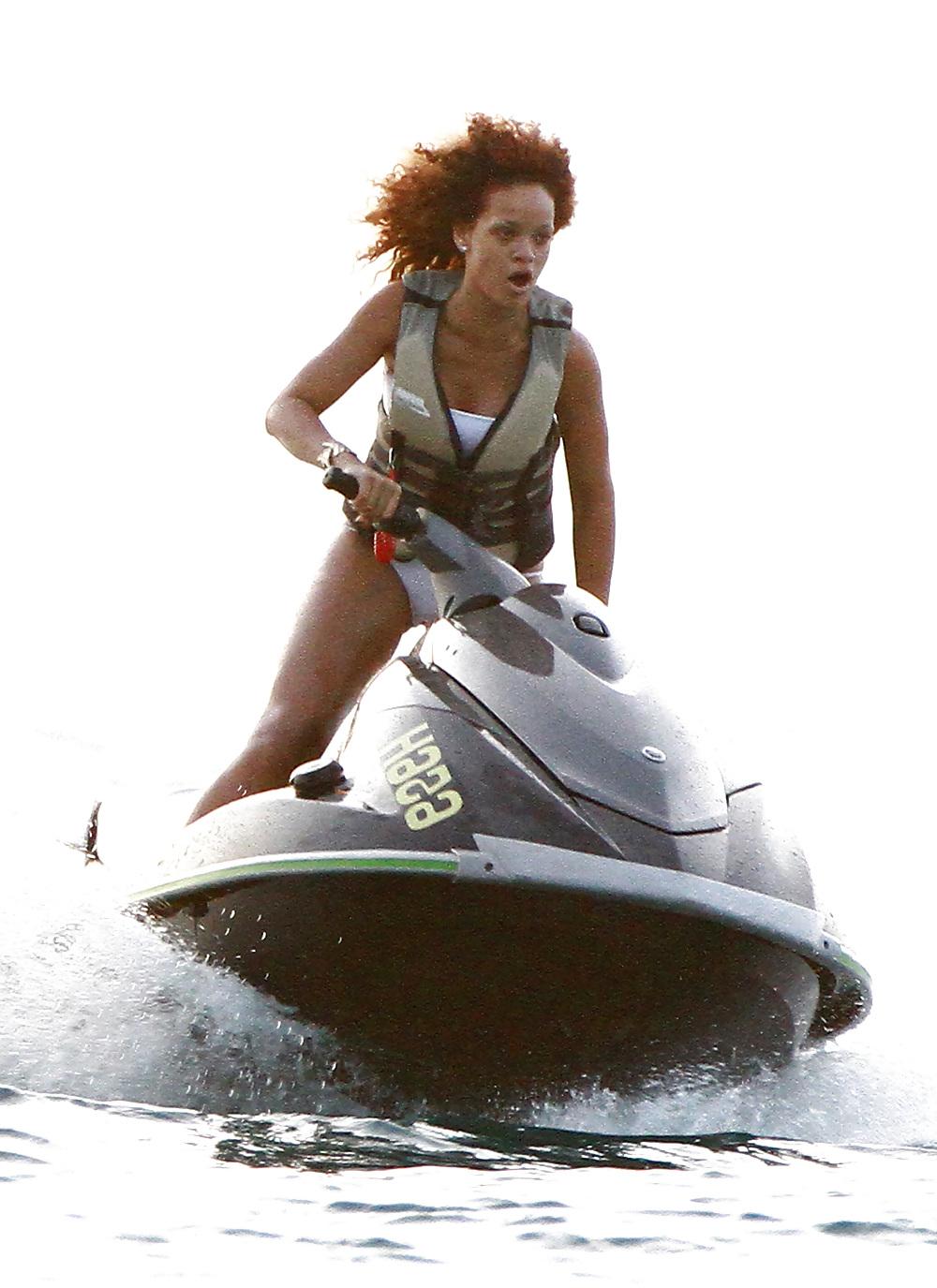 25P Rihanna bikini candids on the beach in Barbados