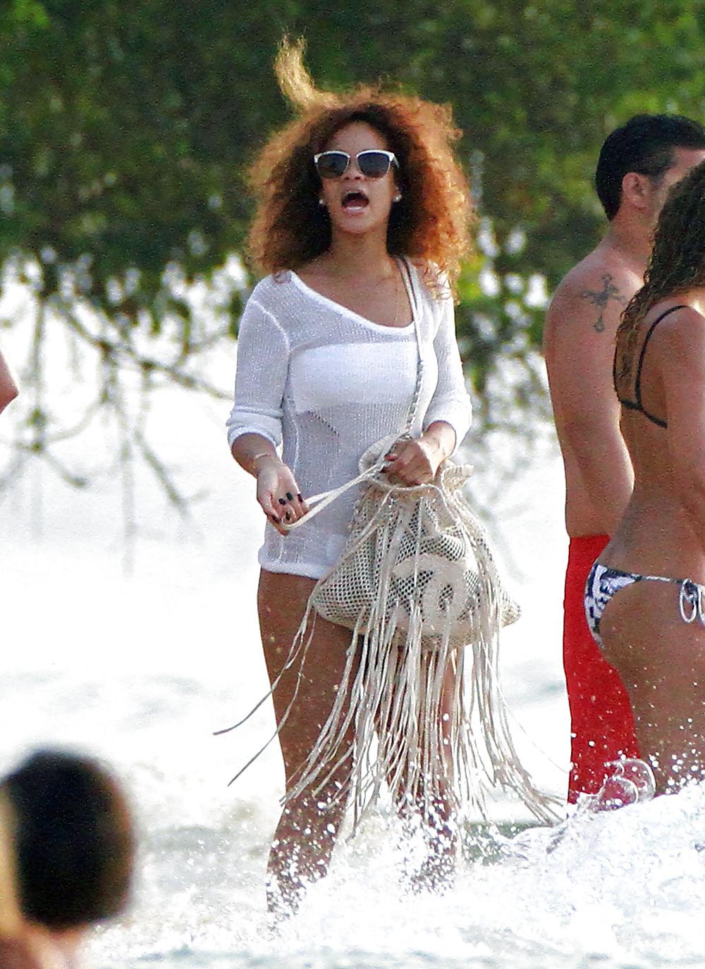 25P Rihanna bikini candids on the beach in Barbados