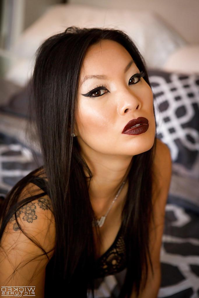 16P Sultry Asian babe Asa Akira modelling in mask and sexy lingerie