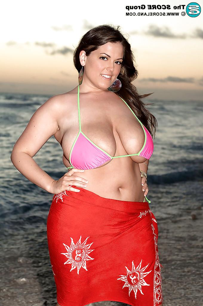 16P Big titted brunette Taylor Steele stripping from her sexy bikini on the beach