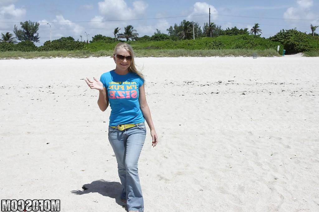 16P Blonde beach babe Britney Brooks posing fully clothed in denim jeans