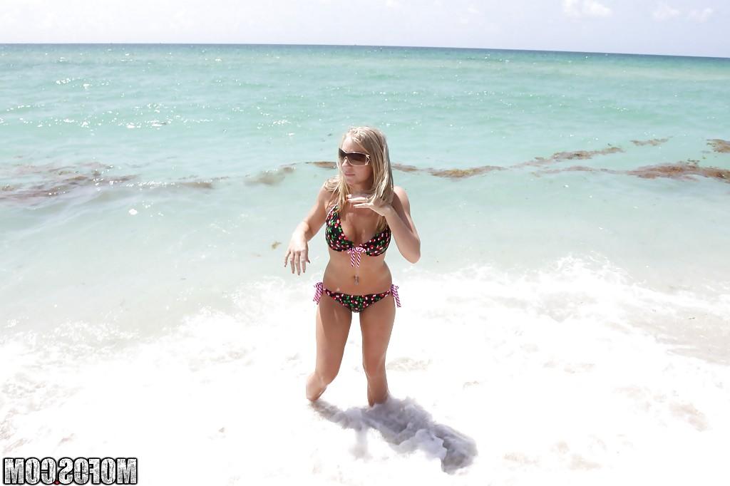 16P Blonde beach babe Britney Brooks posing fully clothed in denim jeans