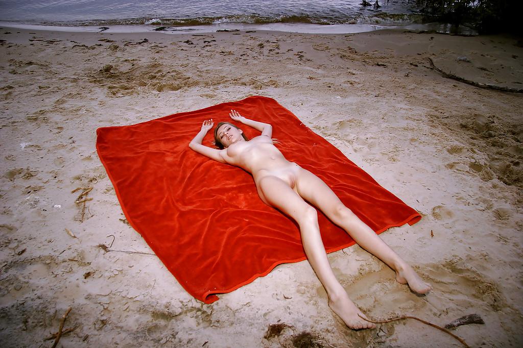 16P Slim teen babe with big tits Ann flaunting naked on the beach