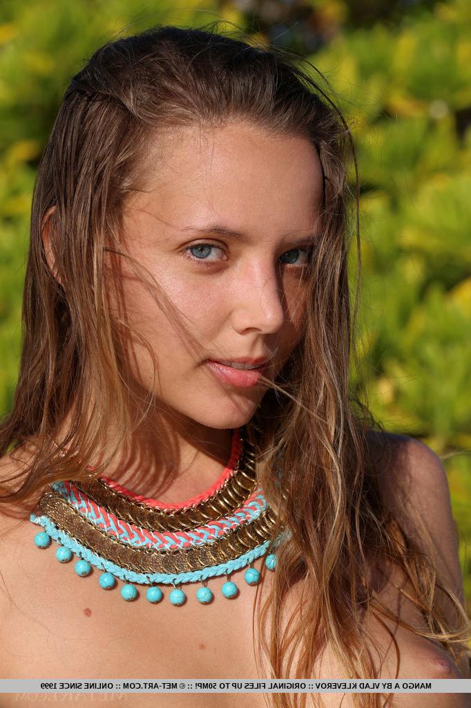 18P European Mango A flaunting wet pussy & small tits on the beach in bare feet