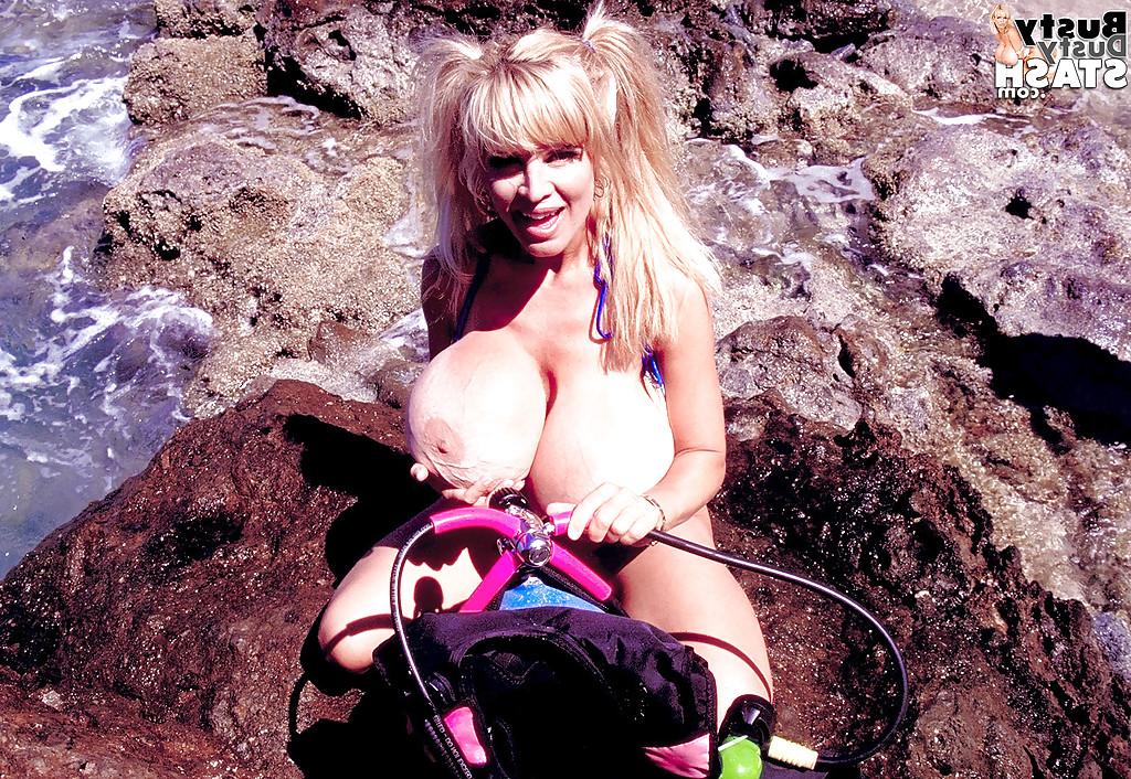 16P Bosomy older blonde beach bunny Busty Dusty playing with her wet fun bags