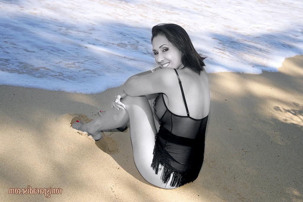 16P Long legged mature Roni posing on the beach in black lacy pantyhose