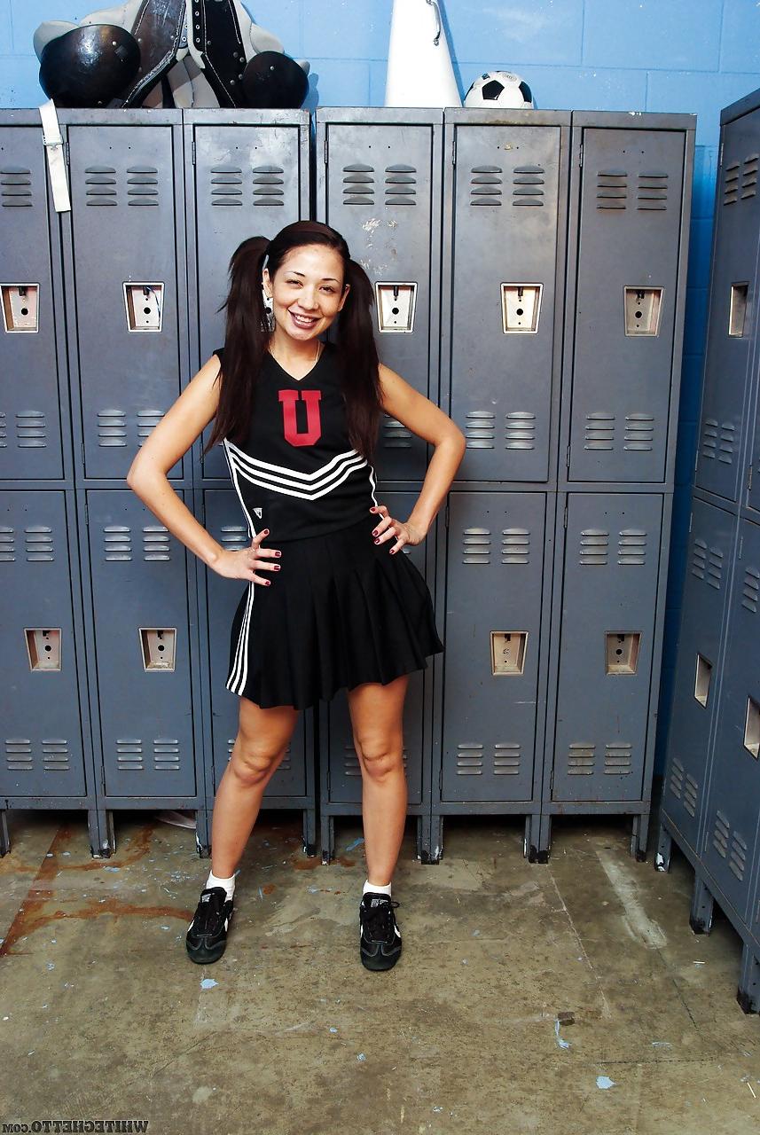 15P Clothed Asian MILF Coco Velvet flashing upskirt ass in cheerleader outfit