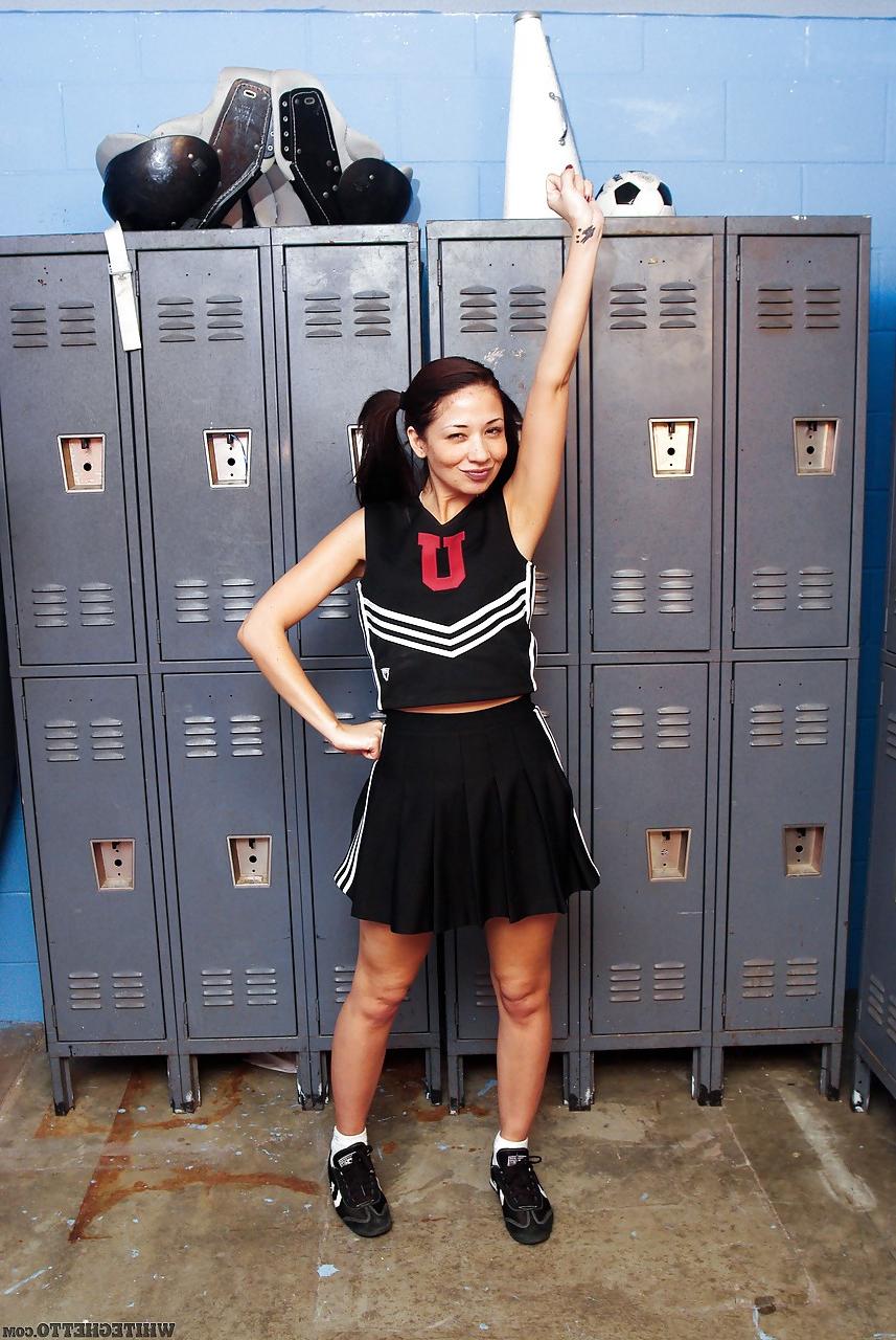 15P Clothed Asian MILF Coco Velvet flashing upskirt ass in cheerleader outfit