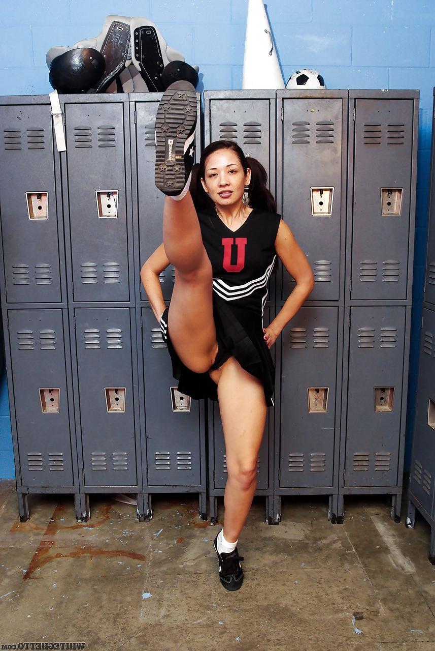 15P Clothed Asian MILF Coco Velvet flashing upskirt ass in cheerleader outfit