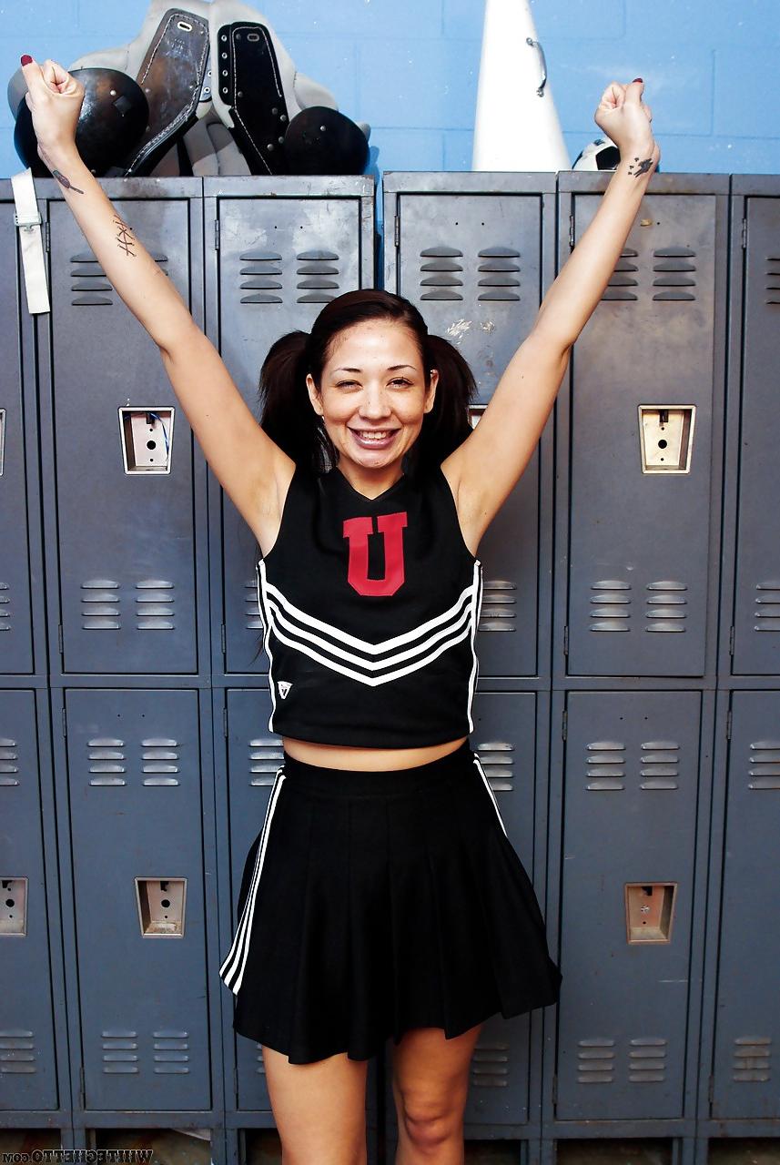 15P Clothed Asian MILF Coco Velvet flashing upskirt ass in cheerleader outfit