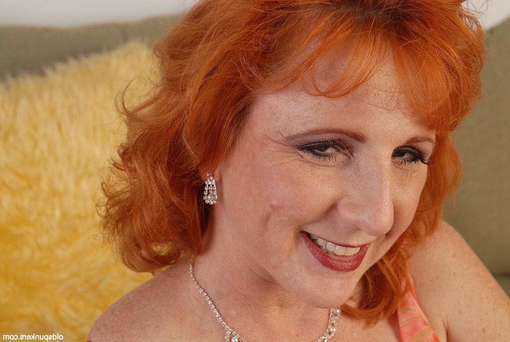 16P Barefoot older redheaded woman Sasha flashing upskirt panties