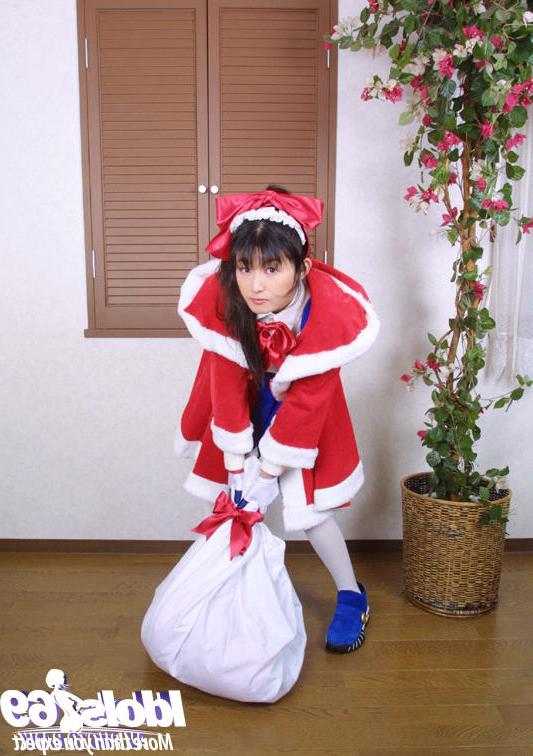 14P Seductive asian babe in christmass outfit uncovering her nice tits and bush