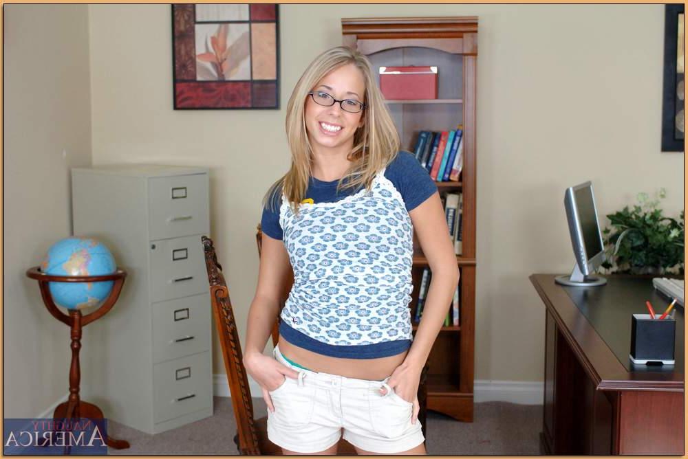 16P Sexy college girl in glasses Ashley Jensen striping nude and spreading