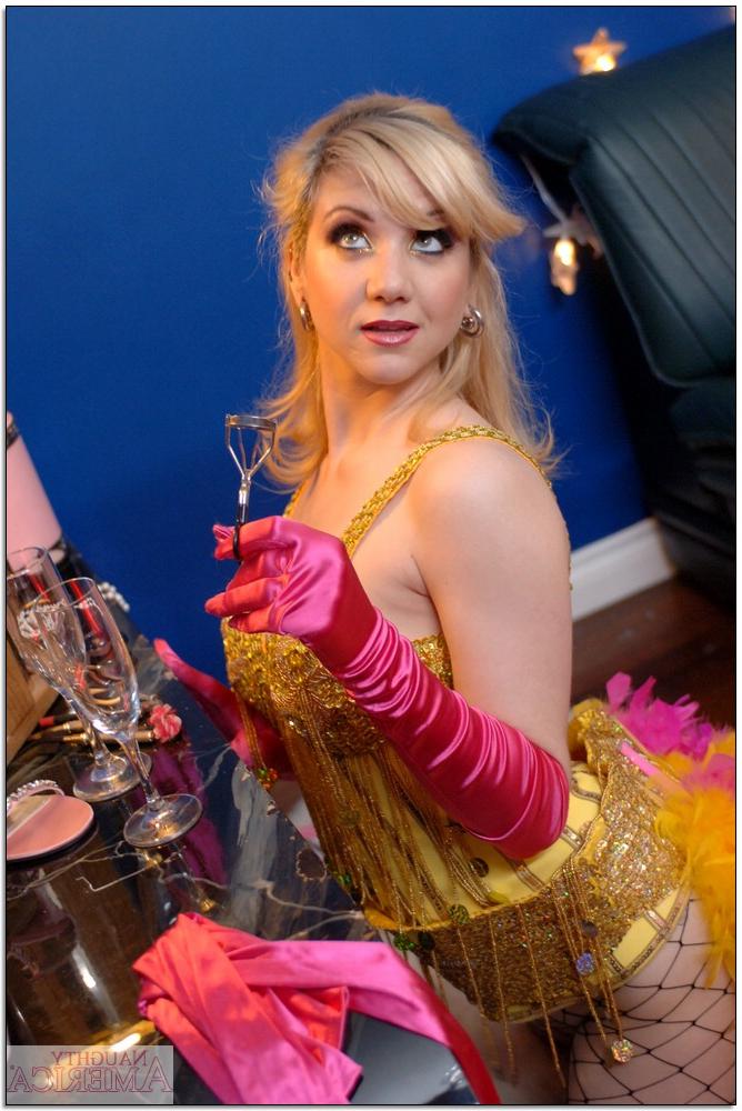 16P Flexible college girl Karina Kay posing in fishnet pantyhose and corset