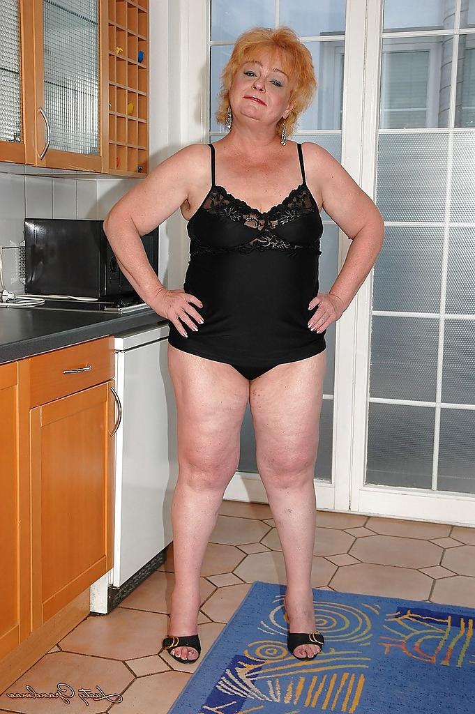 16P Fatty granny on high heels spreading her ass to show her tight holes