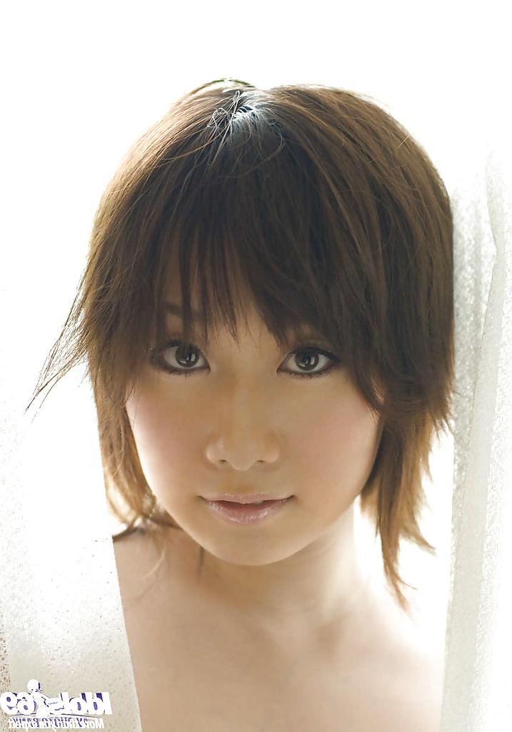 15P Full-bosomed asian coed Hanano Nono stripping off her underwear on the bed