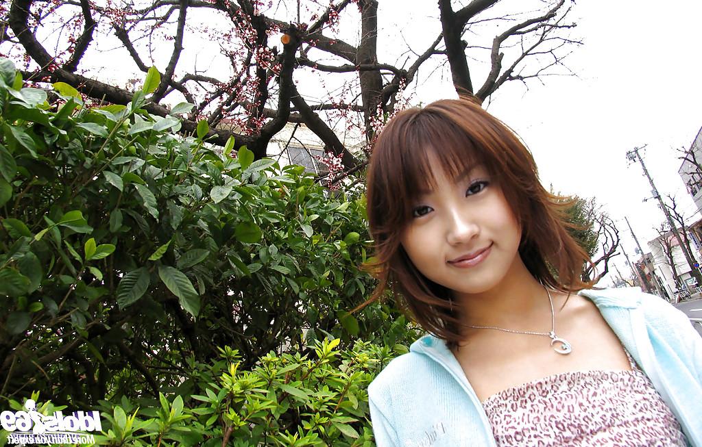 16P Tempting asian coed with unshaven muff stripping off her clothes