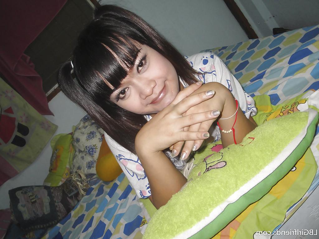 16P Tiny Asian shemale Ping is into kinky anal insertions and pigtails