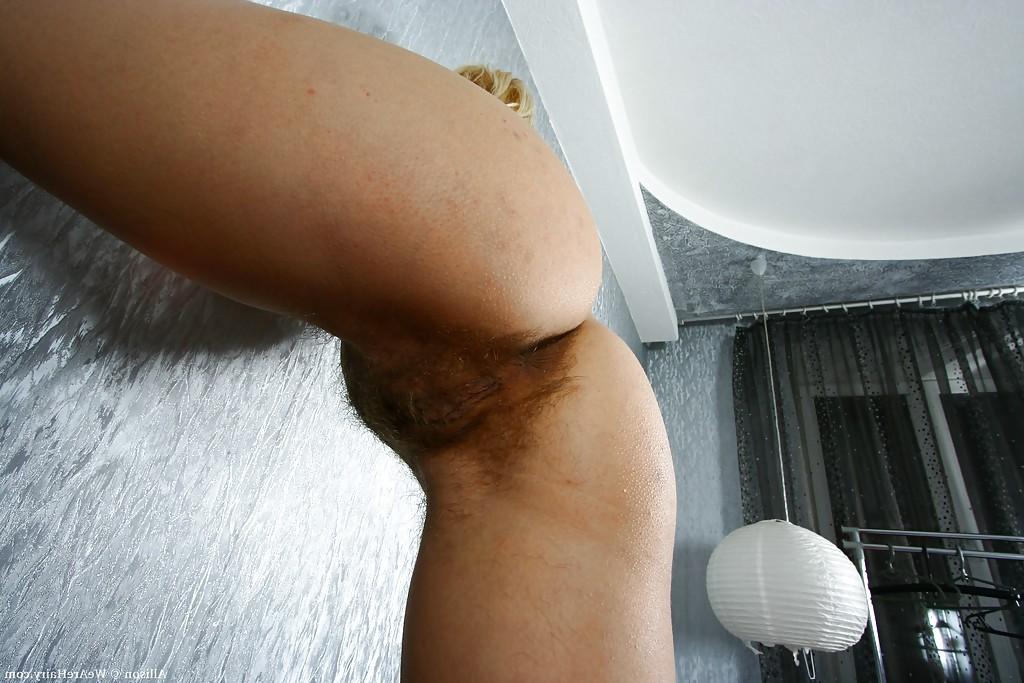 16P Sexy blonde babe in socks Allison posing and spreading her legs