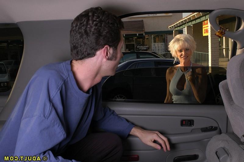 16P Slutty mature blonde goes down on a young meaty pole in the car