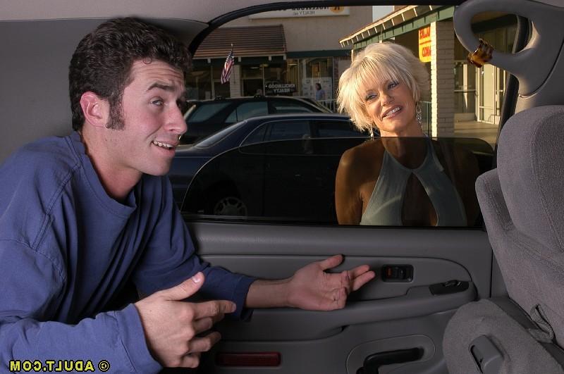 16P Slutty mature blonde goes down on a young meaty pole in the car