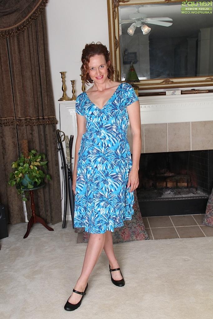16P Leggy clothed mature woman Ajia Simpson strips naked to spread labia lips