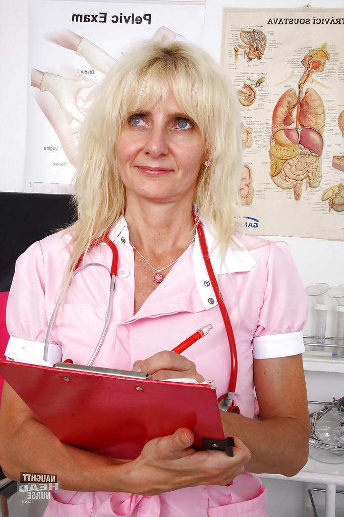 16P Older blonde lady Mia Hot masturbating her granny pussy in exam room