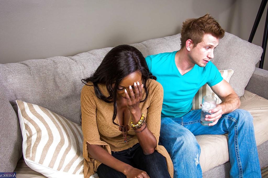 16P Ebony Diamond Jackson is giving a hot deep blowjob on the couch