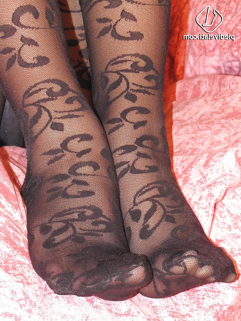 16P Brunette babe in sexy looking pantyhose Valentina loves to show her legs