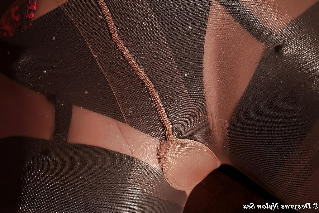 15P Leggy brunette babe Desyra Noir spreading nylon adorned legs