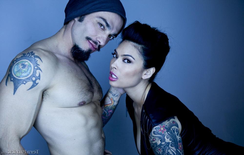 15P Tattooed sexy pornstar Asian showing big tits in sheer lingerie