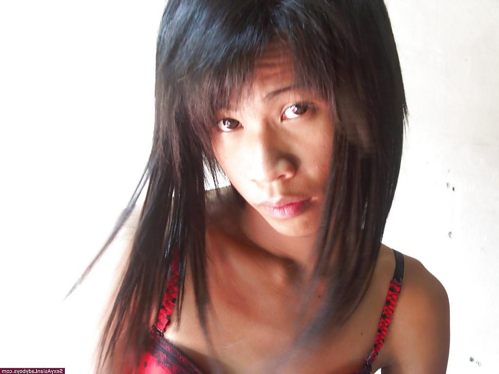 12P Cute horny Asian shemale jerking off her thick cock and spreading