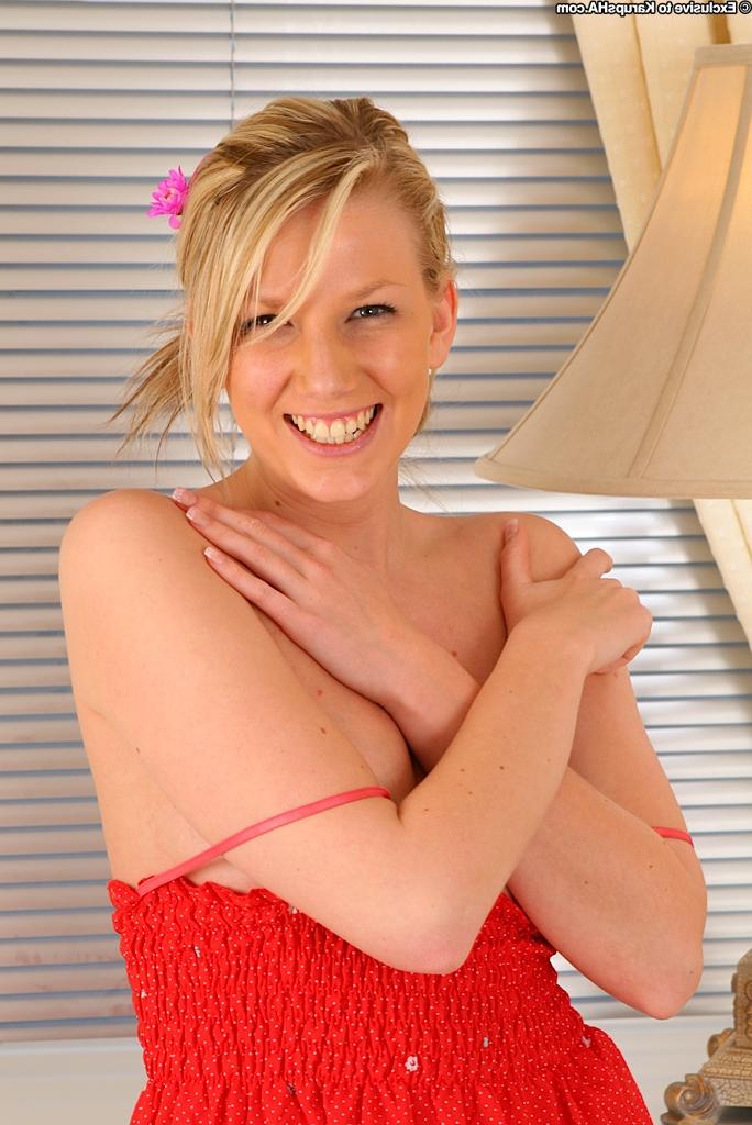 16P Superb blondie Danielle Maye is spreading her perfect legs on camera
