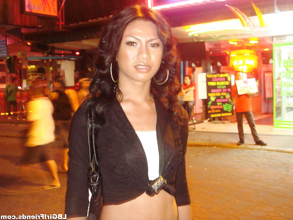 16P Beautiful Asian shemale Candids posing outdoors in slutty clothes