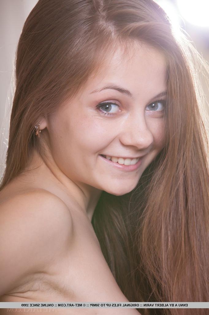 18P Skinny young girl Ennu A spreading bare legs to show natural hairy bush