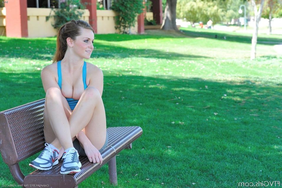 15P Fitness girl in shorts undressing to show her big tits outdoors