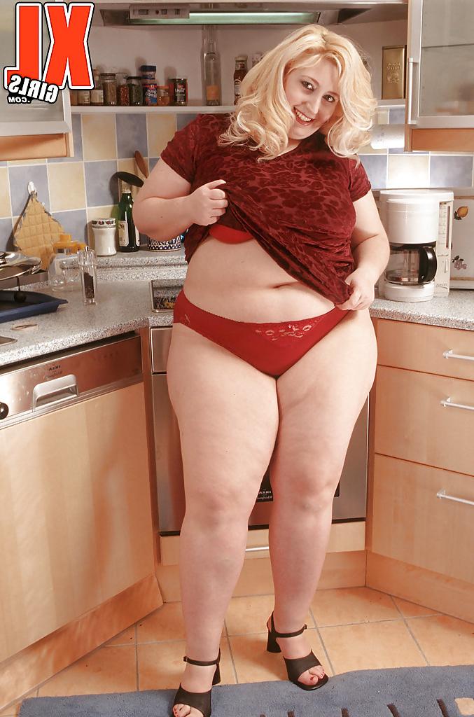 16P Busty blonde SSBBW Radka masturbating in kitchen with sex toy