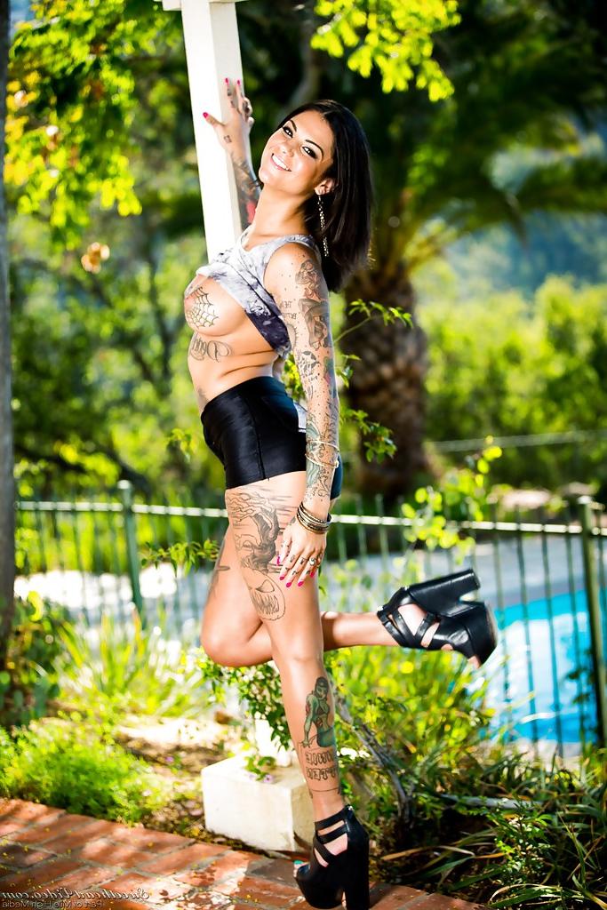 16P Curious Latin whore Bonnie Rotten shows her web-style tattoos