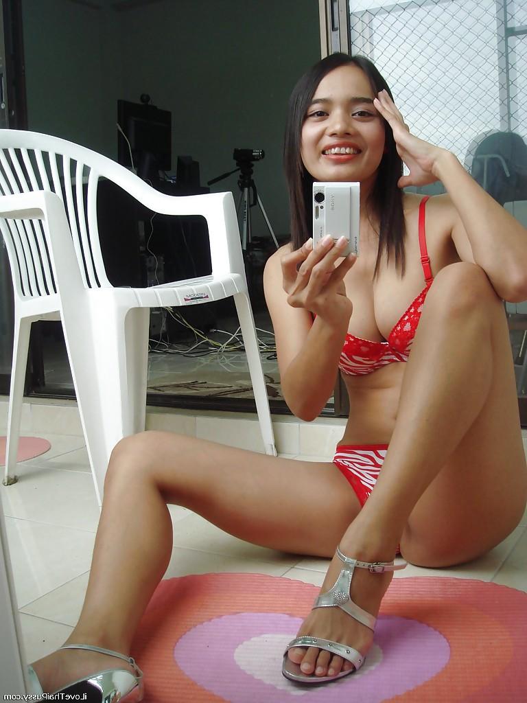 16P Hot asian babe with slender legs posing in lingerie and picturing herself