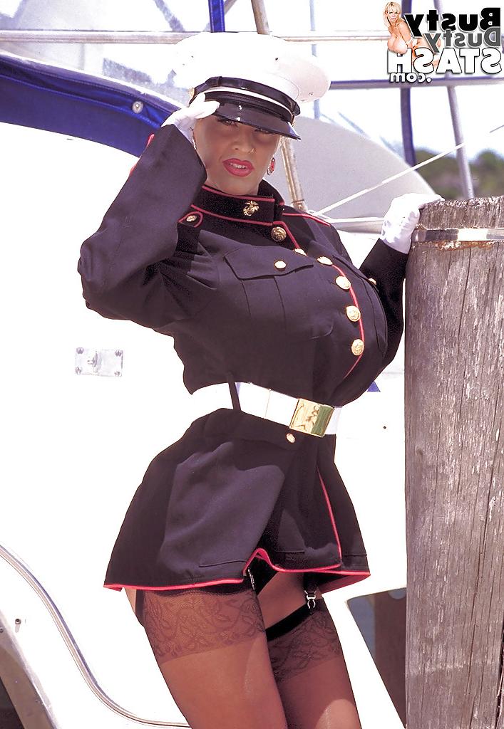 16P Stocking and bustier clad older blonde Busty Dusty baring huge tits outside
