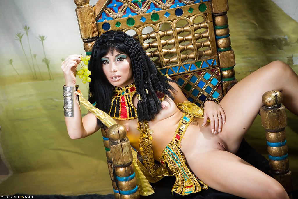 16P Brunette coed Rina Ellis peeling off Cleopatra themed cosplay outfit